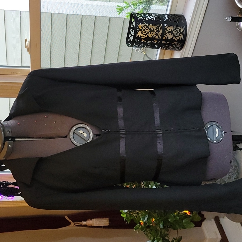 Moda international sexy tailored low cut suit jacket.  Zip up wrinkle free